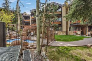 a backyard with a swing and a playground at Laurelwood Condominiums 303 in Snowmass Village