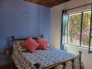 Posteľ alebo postele v izbe v ubytovaní Casa Bugambilias - Hermosa casa centrica para 8