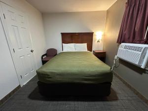Postel nebo postele na pokoji v ubytování Llano Motel