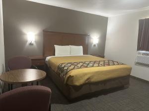 Postel nebo postele na pokoji v ubytování Llano Motel