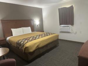 Postel nebo postele na pokoji v ubytování Llano Motel