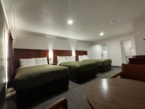 Postel nebo postele na pokoji v ubytování Llano Motel