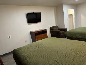 Postel nebo postele na pokoji v ubytování Llano Motel