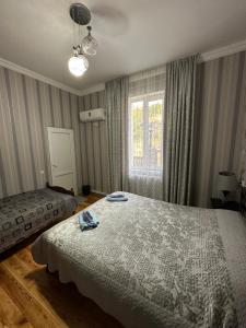 Postel nebo postele na pokoji v ubytování Mate Guesthouse + 28 fotografií