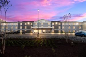 una representación de un hotel con aparcamiento en WoodSpring Suites Hermitage - Nashville Airport, en Hermitage