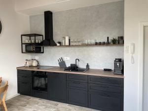 Apartmán Bellaにあるキッチンまたは簡易キッチン