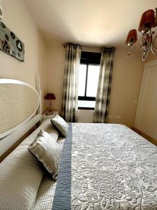 Ein Bett oder Betten in einem Zimmer der Unterkunft Apartamento Lujo Calaceite