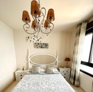 Ein Bett oder Betten in einem Zimmer der Unterkunft Apartamento Lujo Calaceite