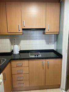 Kuchyň nebo kuchyňský kout v ubytování CAPRI-TURIS Luxe Apartamentos