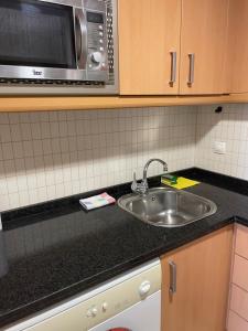 Kuchyň nebo kuchyňský kout v ubytování CAPRI-TURIS Luxe Apartamentos