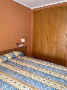 Postel nebo postele na pokoji v ubytování CAPRI-TURIS Luxe Apartamentos
