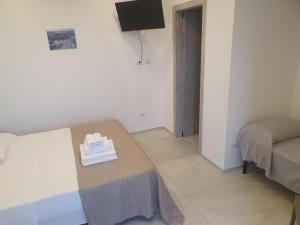 Postel nebo postele na pokoji v ubytování SeA Beach Home