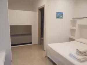 Postel nebo postele na pokoji v ubytování SeA Beach Home