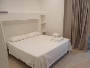 Postel nebo postele na pokoji v ubytování SeA Beach Home