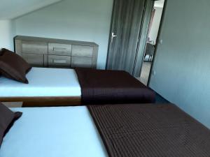 Postel nebo postele na pokoji v ubytování Apartment Karlo