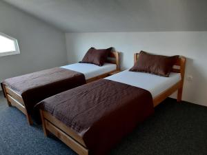 Postel nebo postele na pokoji v ubytování Apartment Karlo