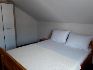 Postel nebo postele na pokoji v ubytování Apartment Karlo