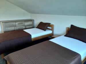 Postel nebo postele na pokoji v ubytování Apartment Karlo