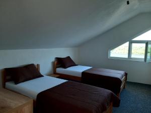 Postel nebo postele na pokoji v ubytování Apartment Karlo