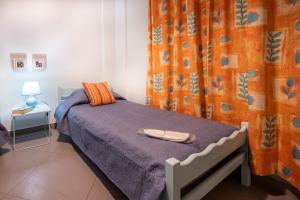 Postel nebo postele na pokoji v ubytování Filoxenos Apartment