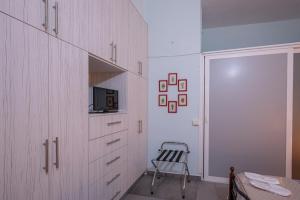 Kuchyň nebo kuchyňský kout v ubytování Filoxenos Apartment
