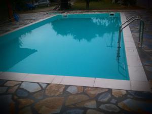 Bazén v ubytování Guesthouse Kalypso nebo v jeho okolí + 16 fotografií
