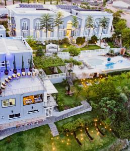 Um jardim em Vila Pugliesi Hotel Boutique