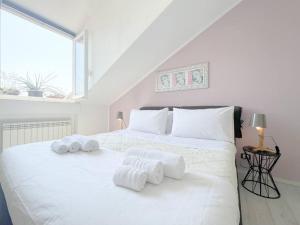 Ένα ή περισσότερα κρεβάτια σε δωμάτιο στο [Elegante appartamento 100 Mq] Parcheggio - Wi fi