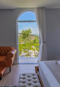 Cama ou camas em um quarto em Vila Pugliesi Hotel Boutique