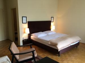 Postel nebo postele na pokoji v ubytování Hotel Garni - Appartements Fuksas
