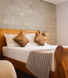 Cama ou camas em um quarto em Vila Pugliesi Hotel Boutique