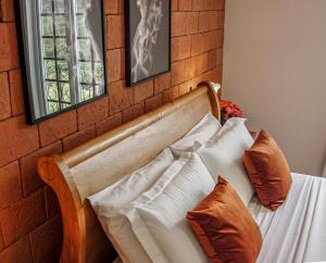 Cama ou camas em um quarto em Vila Pugliesi Hotel Boutique