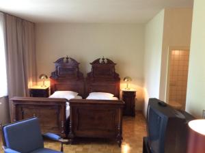 Llit o llits en una habitació de Hotel Garni - Appartements Fuksas