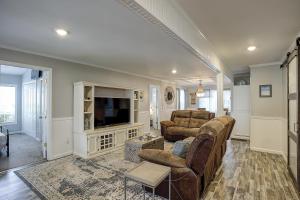 a living room with two couches and a television at Pura Vida - A -Murrells Inlet in Myrtle Beach