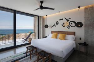 Letto o letti in una camera di Eolia Sustainable Design Hotel