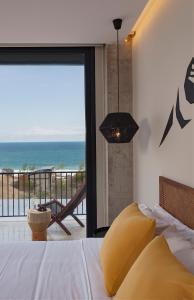 Letto o letti in una camera di Eolia Sustainable Design Hotel