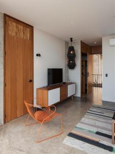 TV o dispositivi per l'intrattenimento presso Eolia Sustainable Design Hotel
