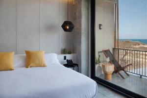 Letto o letti in una camera di Eolia Sustainable Design Hotel