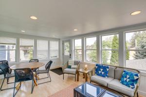a living room with a couch and a table at Elkhart Lake Vacation Rental 3 Mi to Road America! in Elkhart Lake