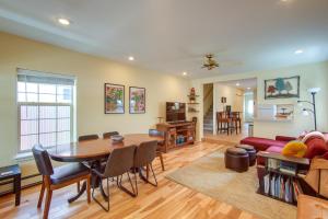 a living room with a table and a couch at Buena Vista Shambala Sanctuary Near Main St! in Buena Vista
