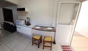 Una cocina o kitchenette en Apartamento 06 Mobiliado