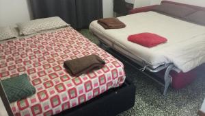 מיטה או מיטות בחדר ב-Federica House
