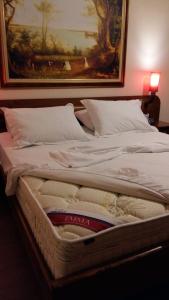 Letto o letti in una camera di Drini Hotel