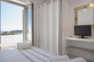 Postel nebo postele na pokoji v ubytování Aeraki Villas