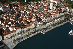 an aerial view of a city with a harbor at Apartment 4 You in Split in Split