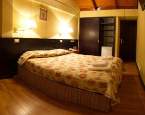 Cama ou camas em um quarto em Hotel Villa Brescia