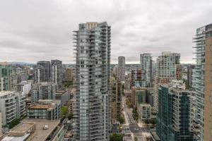 a view of a city with tall buildings at Modern studio in Downtown Vancouver in Vancouver