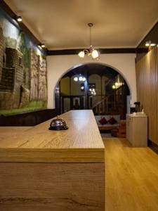 Uma área de estar em Hotel Santa Maria