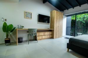 Телевізор і / або розважальний центр в Barcelo Coliving