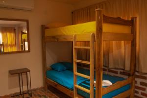 Postel nebo postele na pokoji v ubytování Casa Arev